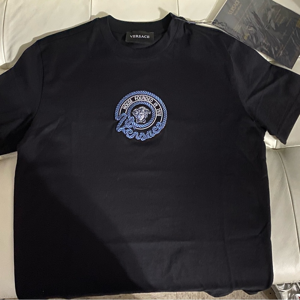 Medium Versace black with logo in the center